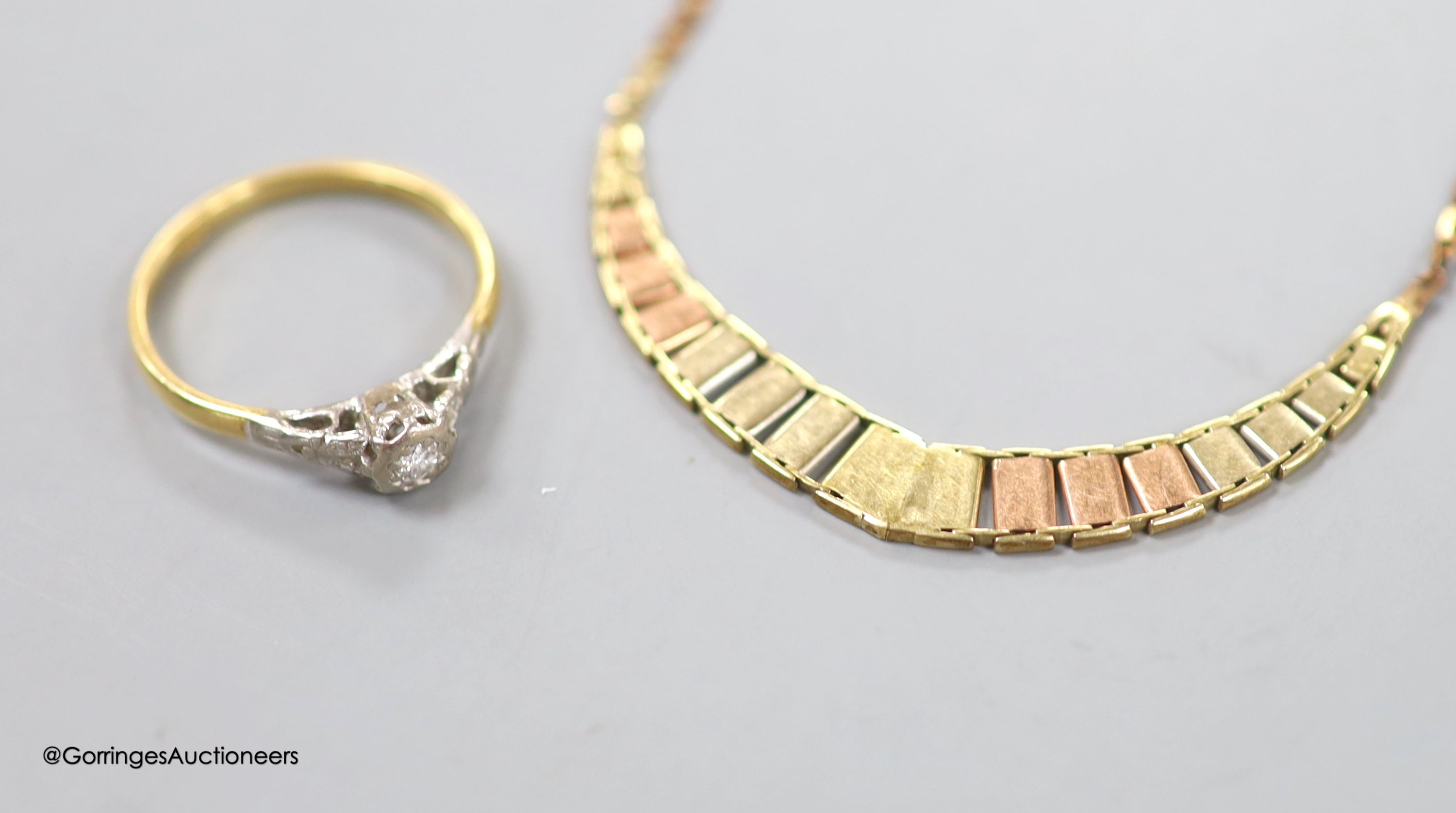 A 9ct three-colour gold bracelet, 3.6 grams and an 18ct gold partially-gem-set ring, gross 2.1 grams.